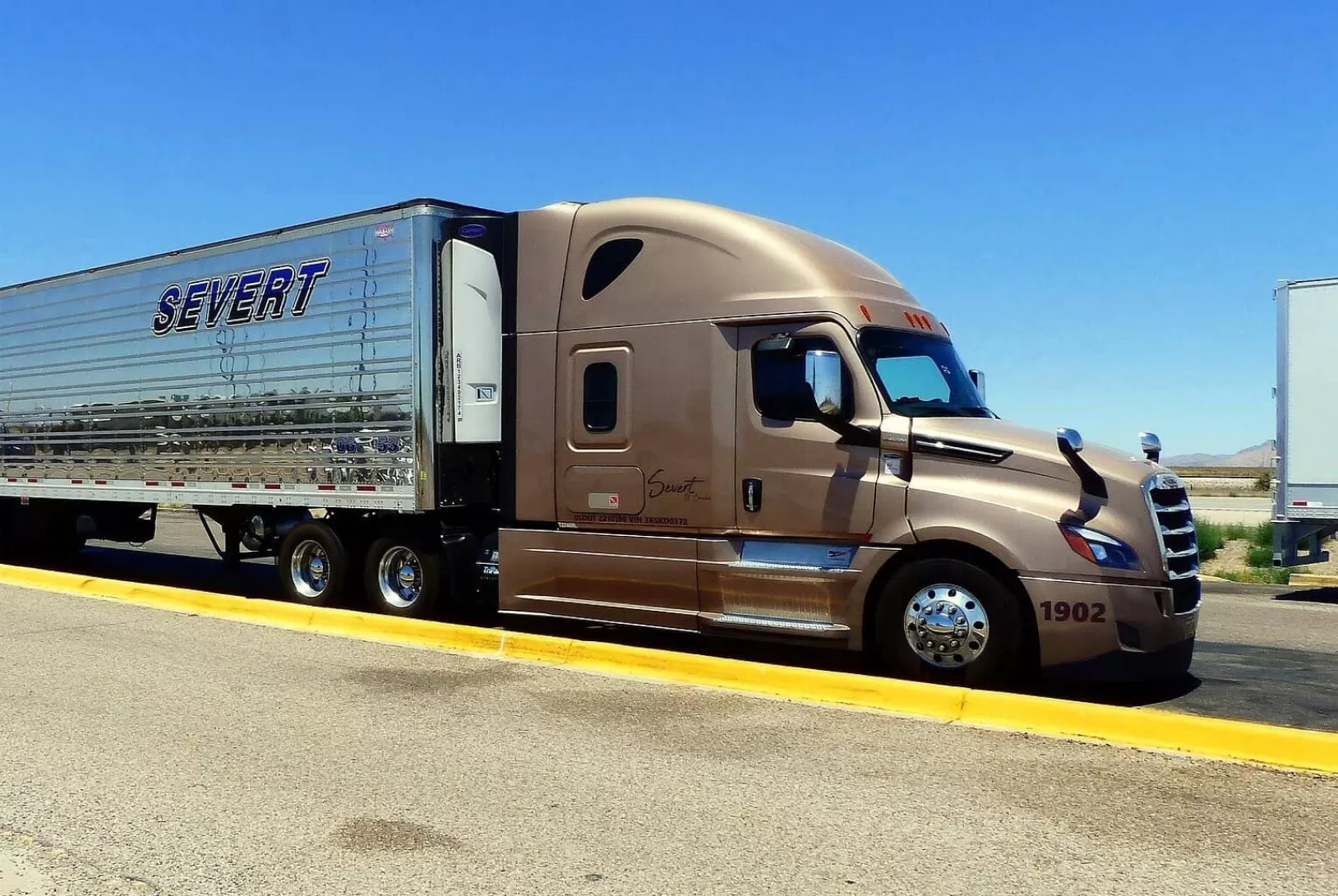 Brown truck on the road