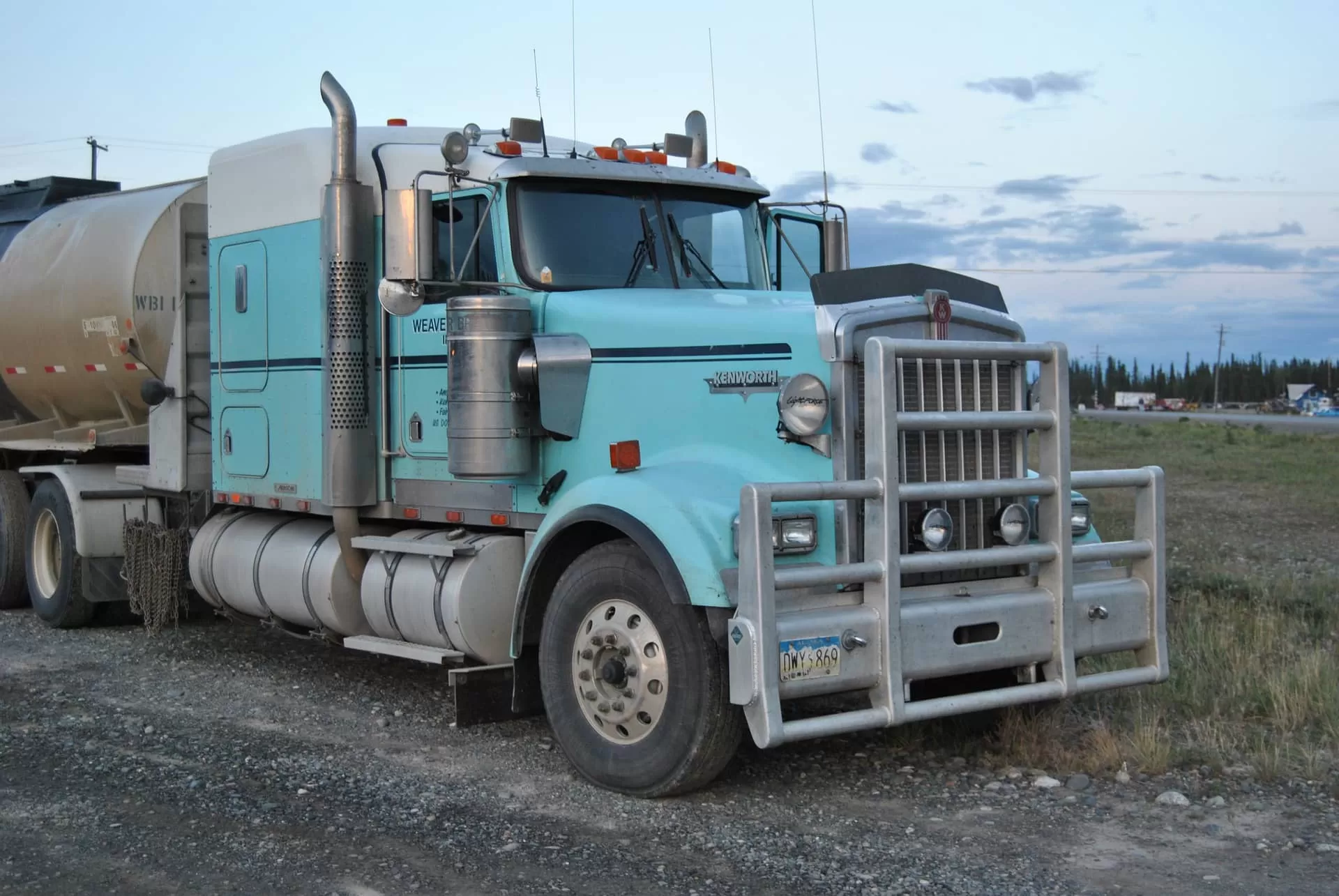 Blue Kenworth truck on the field