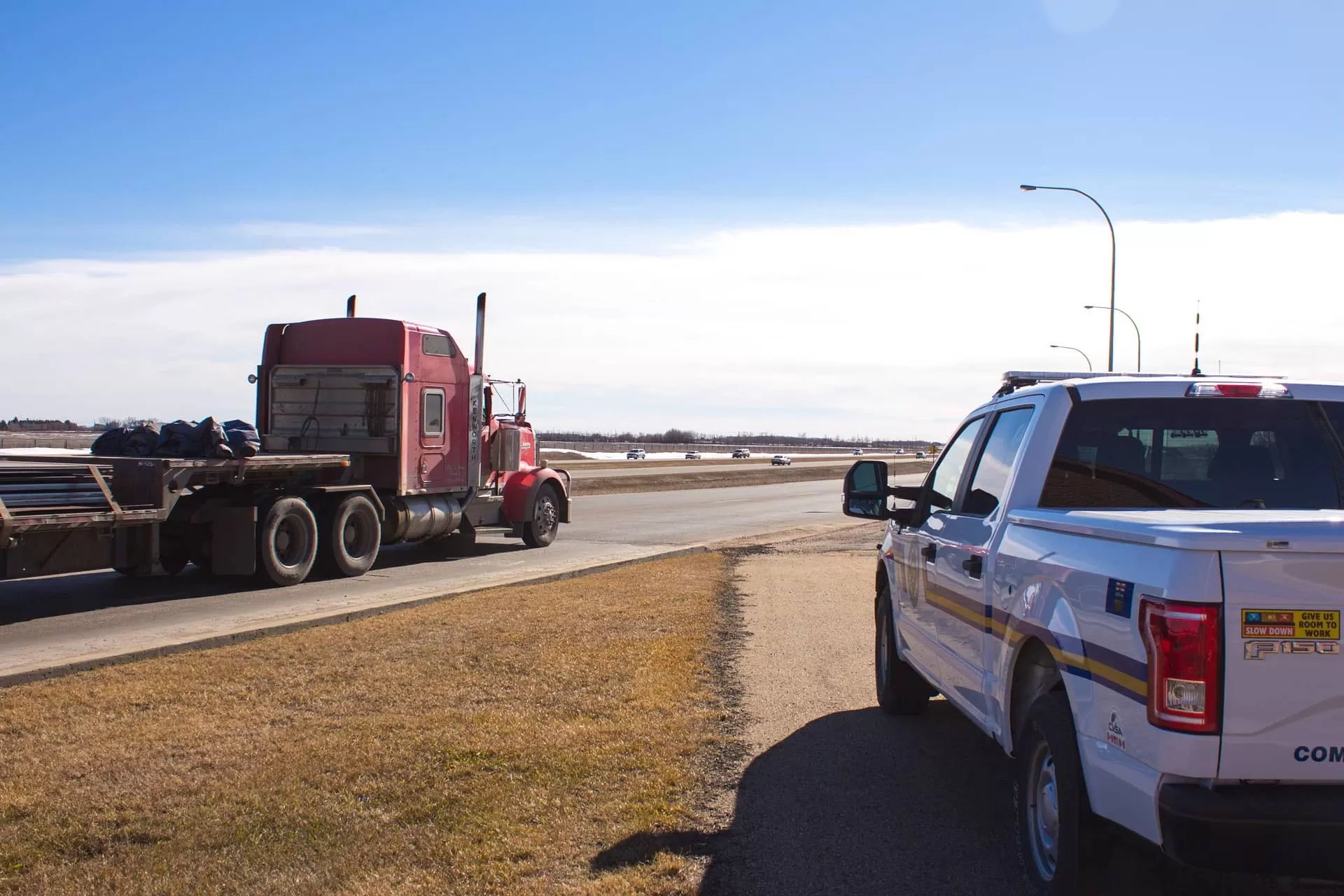 Truck and car on the road