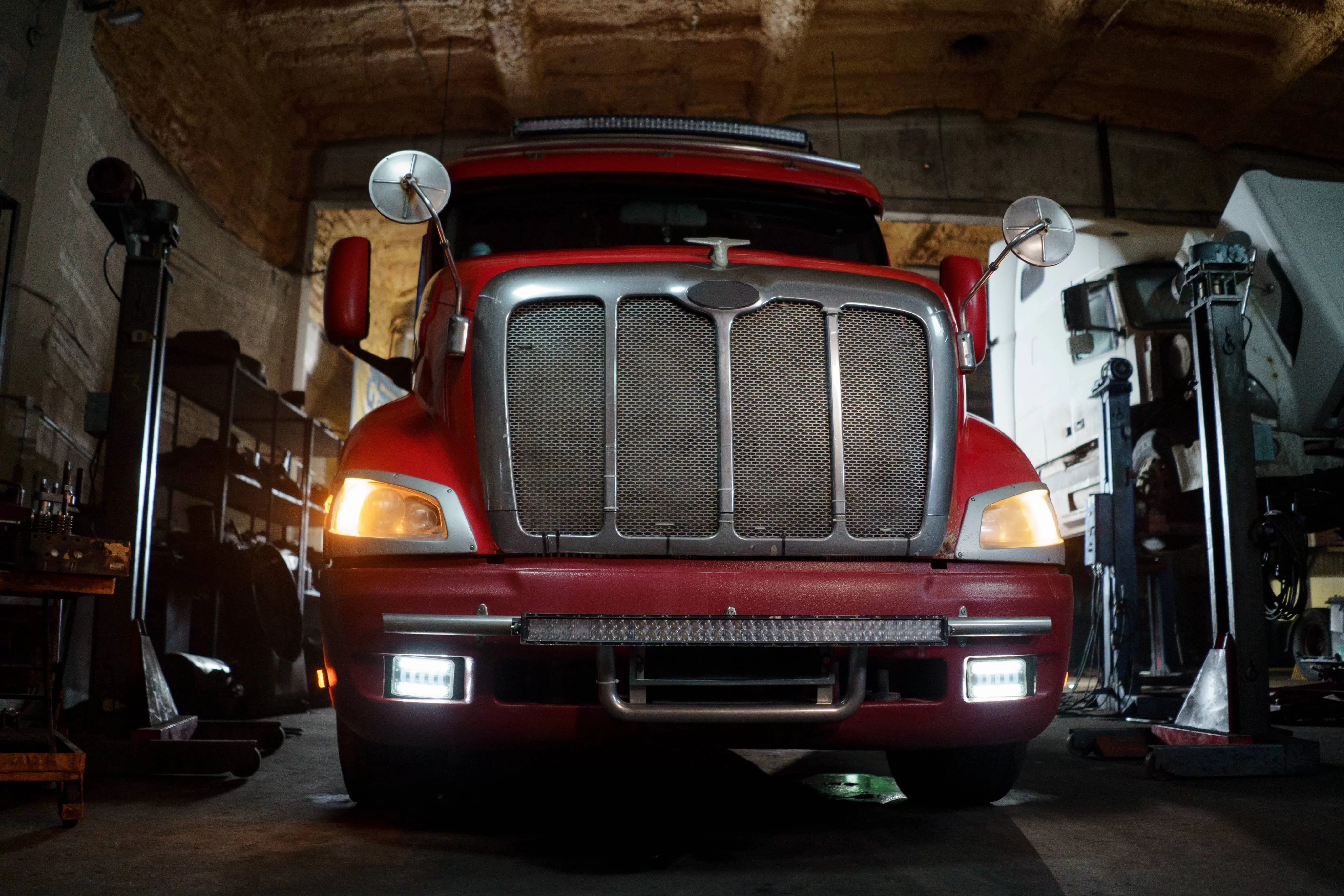 Red truck in garage