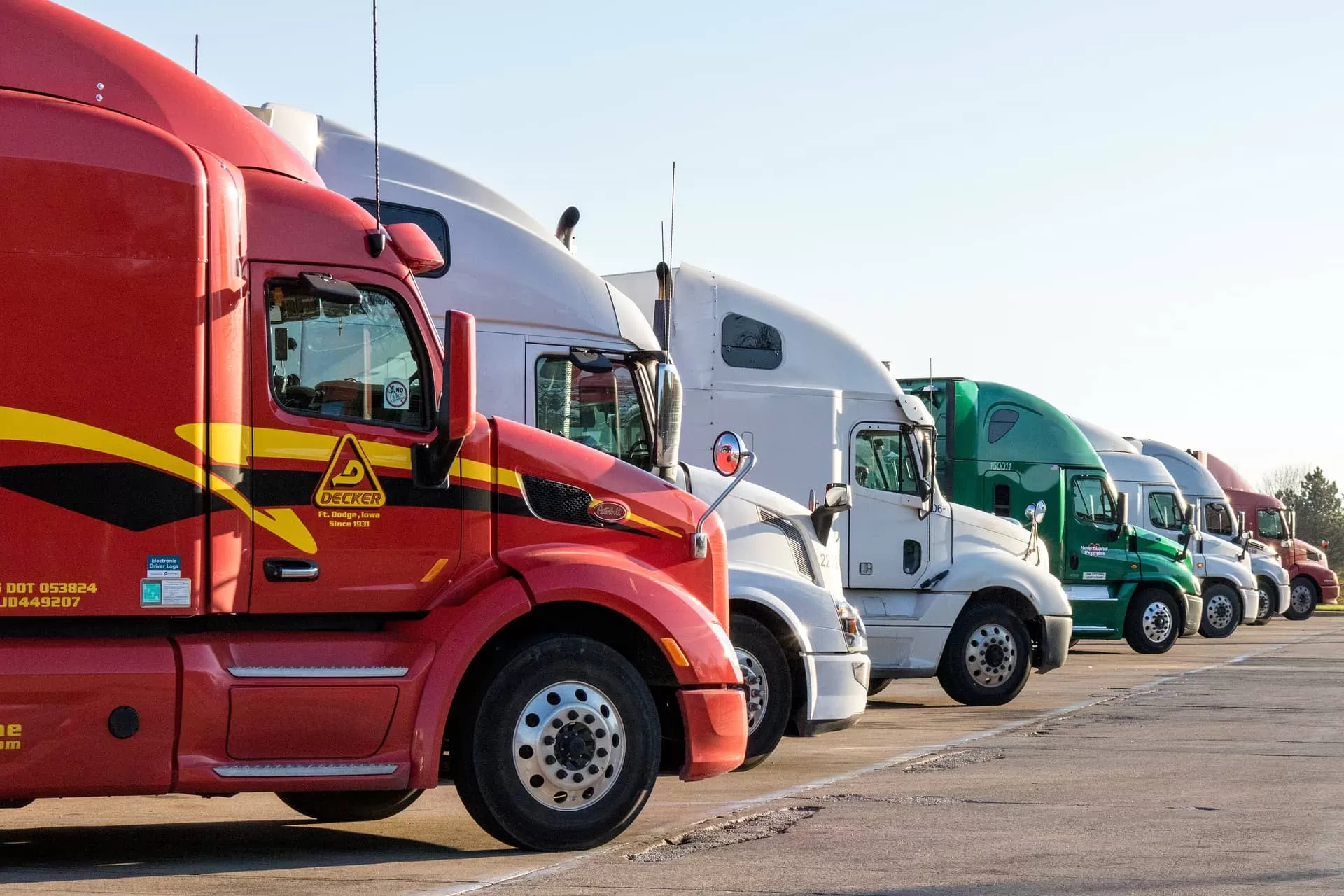 Trucks have different colors on the parking