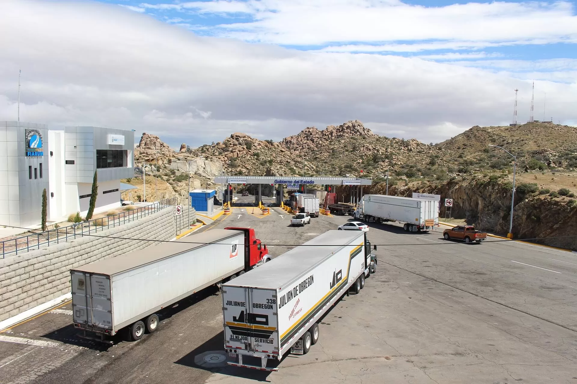 Trucks waiting to pay for the road