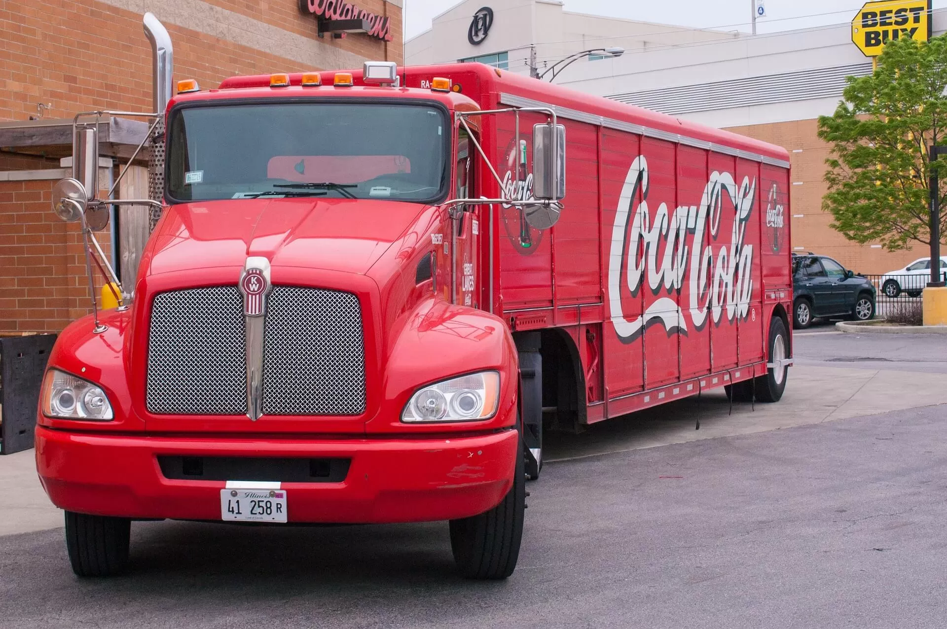 Red KenWorth truck with label Coca Cola