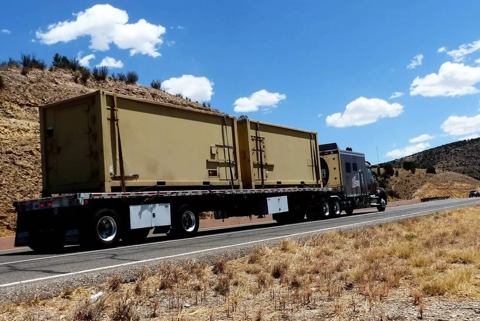 The truck goes to the top of the road