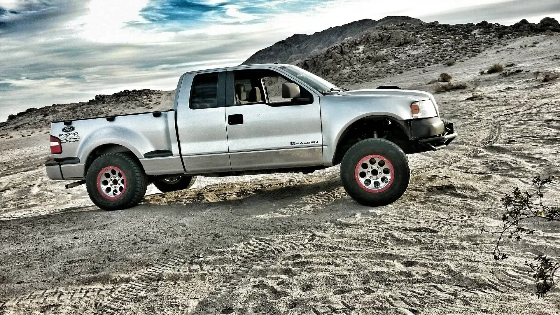 Ford pickup on sand