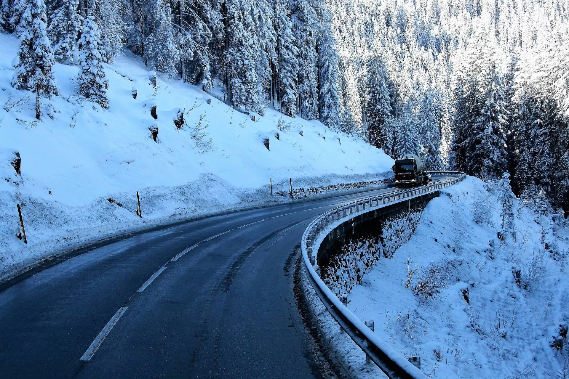 Truck goes top on snowy road