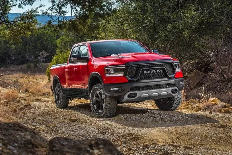 Red pickup Dodge RAM on offroad
