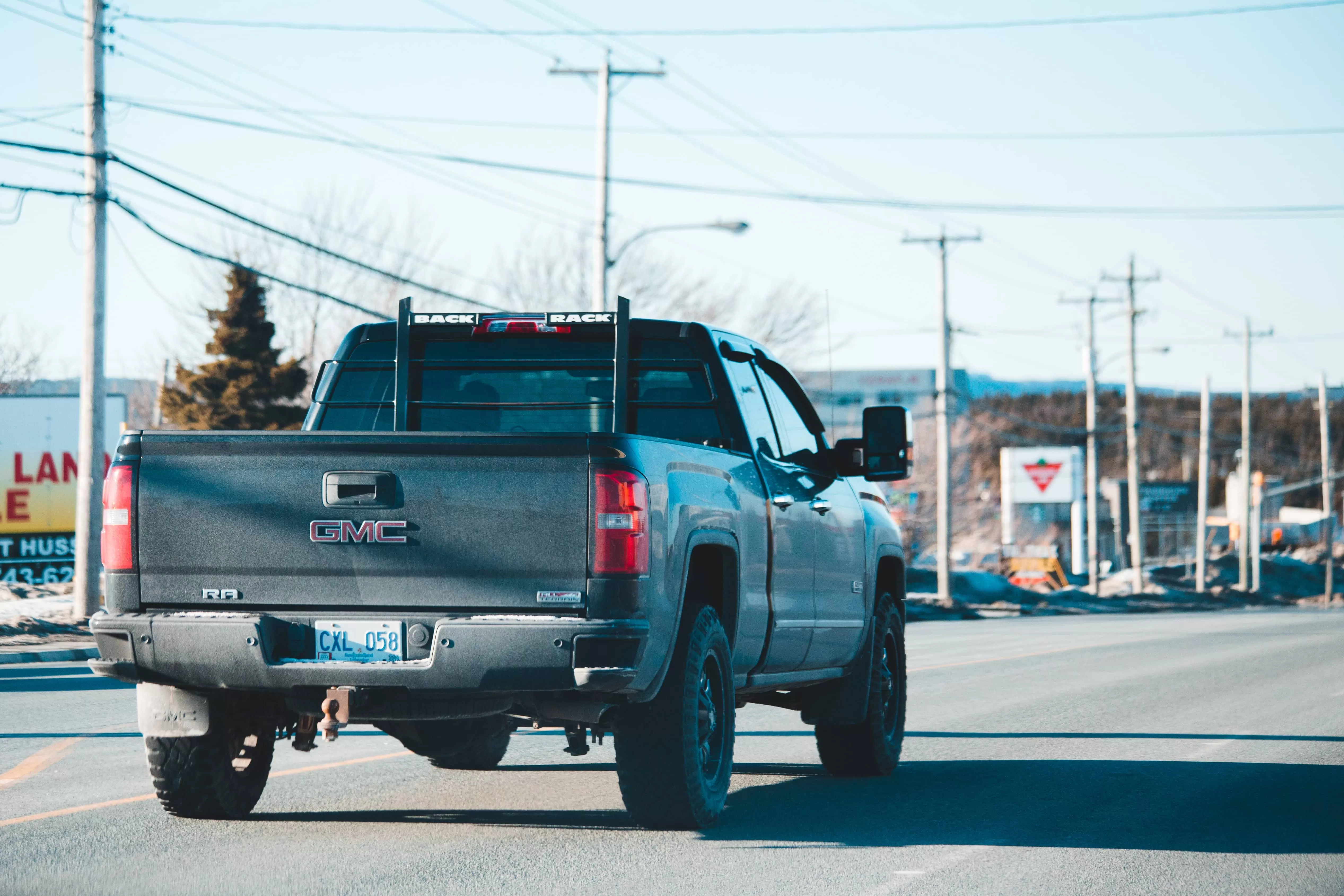 GMC pickup truck on the road