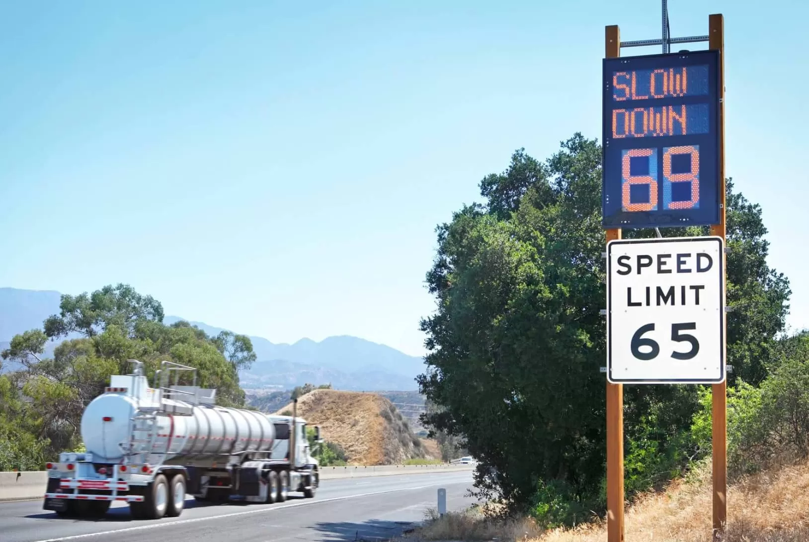 Truck on the road and mark speed limit