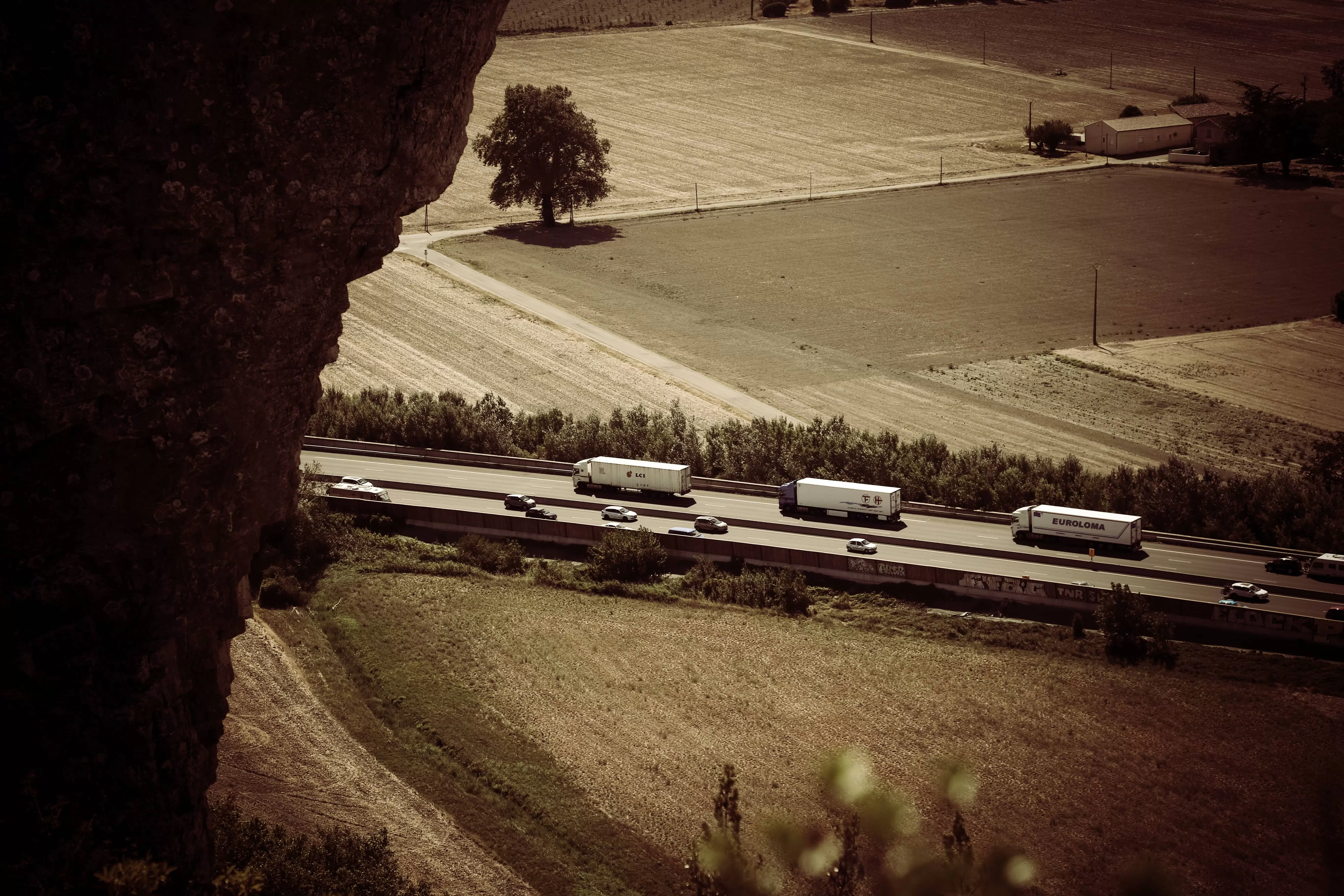 Trucks on the road top view