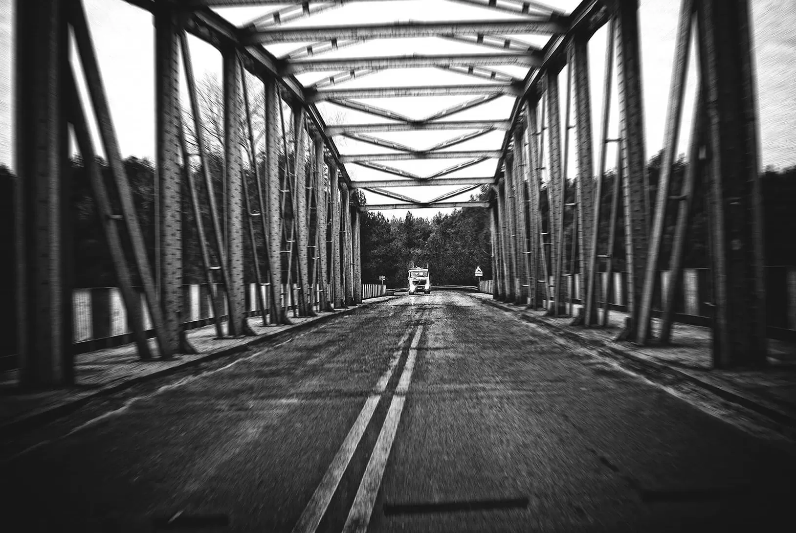 Road with truck on the bridge on grayscale background