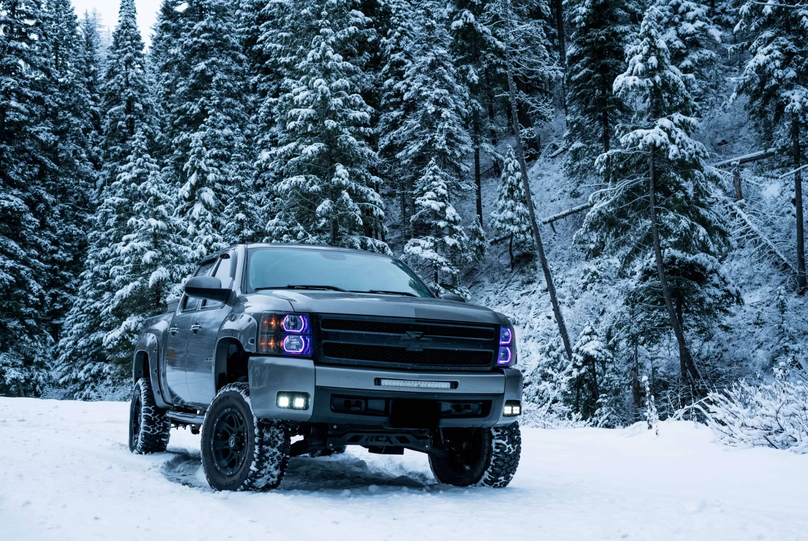 chevrolet in the snowy forest