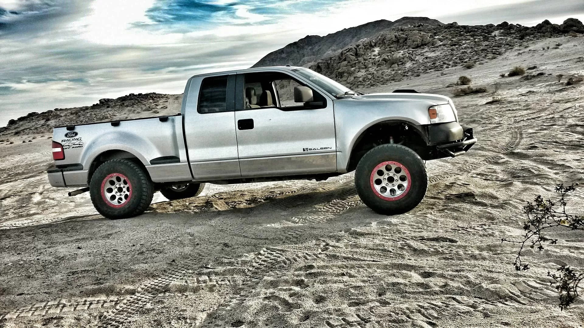 ford pickup on sand