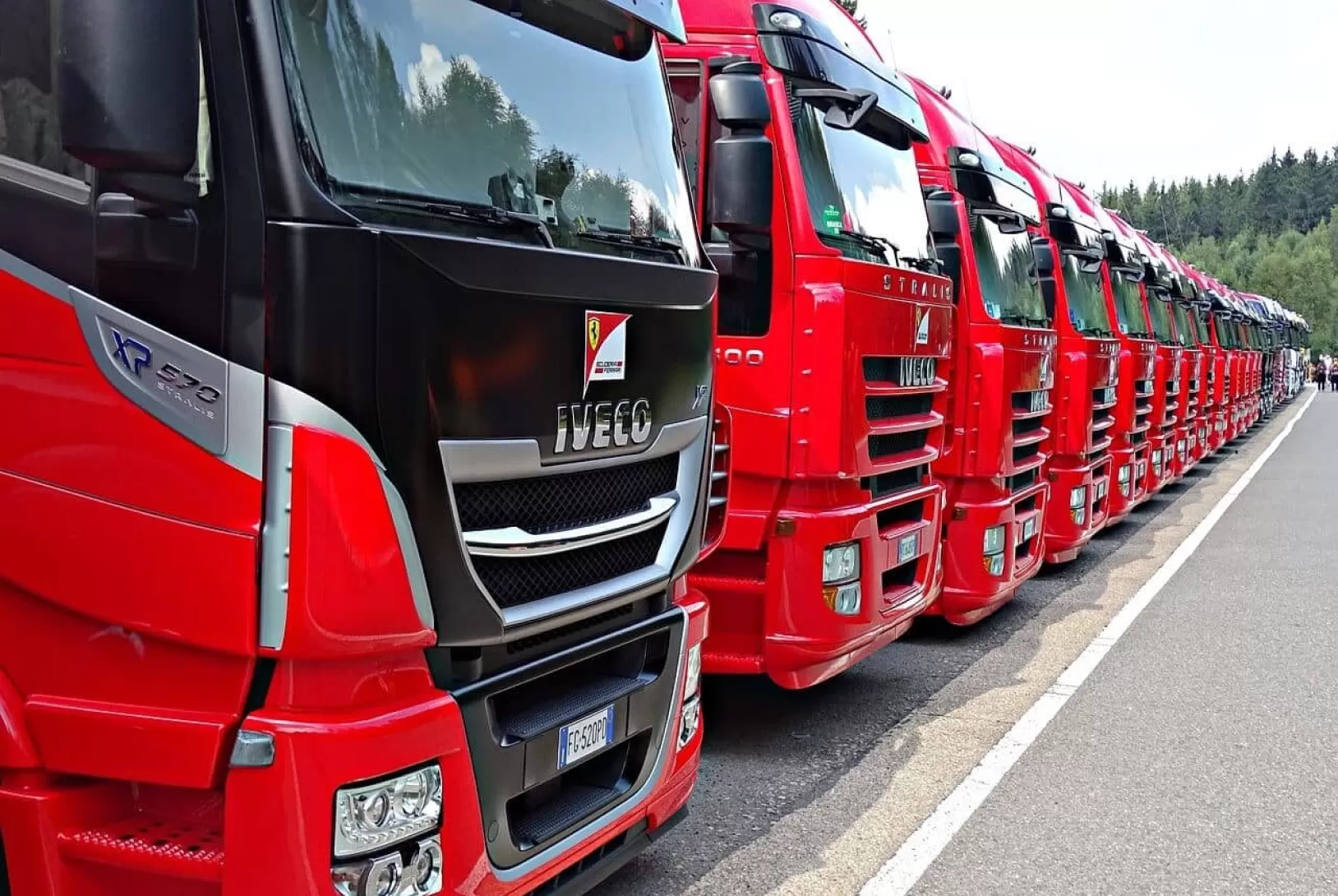 red iveco trucks on the parking