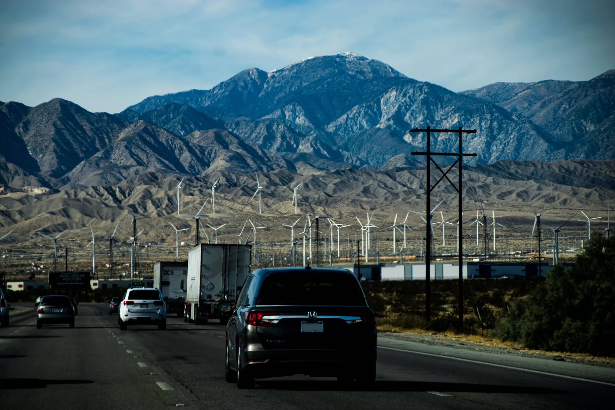 road with trucks and cars scaled